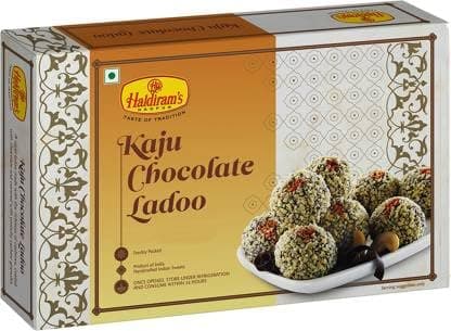 Haldiram's Nagpur Kaju Chocolate Ladoo 250g � A fusion of cashew and chocolate, these ladoos are a modern twist to traditional mithai