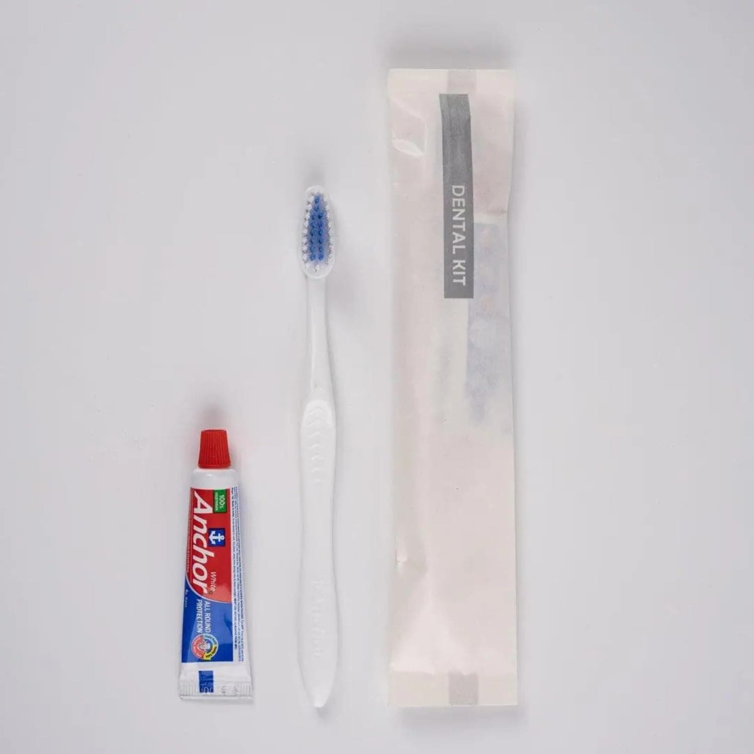 Polism Hotel Dental Kit with Toothbrush and Toothpaste, White Pouch, Pack of 100 - Hotel Toiletries Kit for Guest House, Marriage Hall