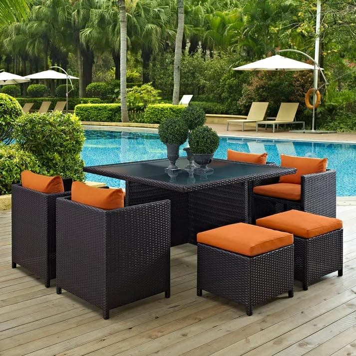 DEVOKO 7-Piece Outdoor Rattan Wicker Dining Set for Terrace & Garden, Poolside Powder Coated Iron Dark Brown & Orange Cushioned Chairs, Ottoman & Table (Table Top: Without Glass)