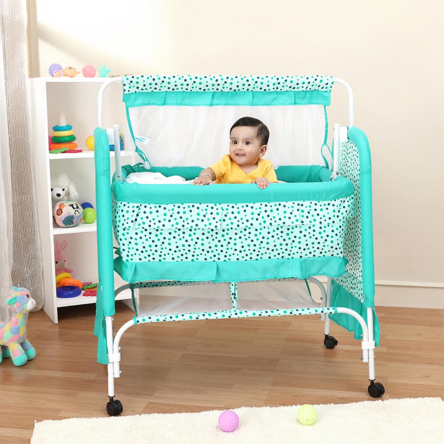 Amazon Brand - Supples Premium Baby Cradle with Swing & Mosquito Net | for 0–8 Months | Swing Lock & 4 Wheels with Brake | Soft & Comfortable Sleep | Sturdy Mild Steel Frame | Sea Green